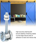 Tough As Nails M10 Track Roller Wheels Featuring 38mm Dead Smooth Premium Stainless Steel Beam Trolley Assembly in a room with blue barn doors.