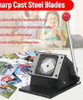 Square Magnet Button Cutter For Paper And Photos, 2x2 Inch Punch Cutter with steel blades and ergonomic handle displayed on a table.
