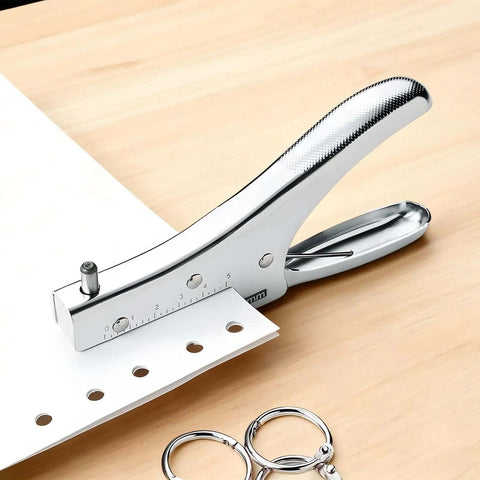 Handheld Metal Hole Puncher With 6mm Holes 10 Sheet Capacity 1.9 Inch Throat Rugged All Metal Punch Tool on wooden surface