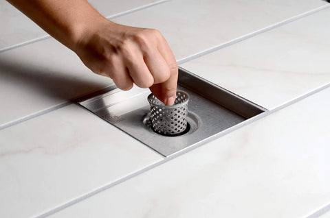 Installing 4x4 Inch Square Shower Drain Grate Built In Stainless Steel That Is Corrosion Resistant And Features A Self Cleansing Sloped Channel