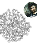 Plastic cone spikes and studs; close-up of silver plastic pieces for jackets; DIY rivet embellishments