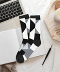Fresh Black And White Grid Pattern Ankle And Crew Socks Men Women Unisex Athletic Daily Workout breathable on desk with notebook.