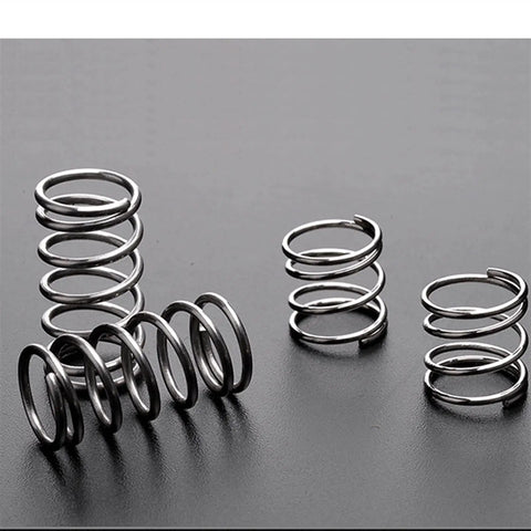 Ten Pieces Carbon Steel Coil Springs Set for DIY Projects and Repairs, 1.0mm Wire, 16mm Outer Diameter, displayed on surface