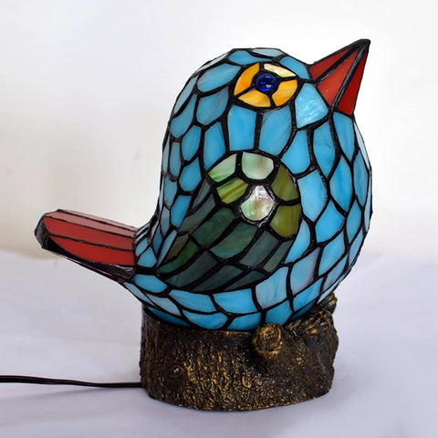 Bird Themed Glass Nightstand Lamp With Blue Green Stained Shade showing bird design on resin base for kids room or bedroom decor.