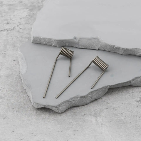 Heavy Duty Letterbox Hinge Springs With Flex Arms Dual Size Fit Premium Steel Construction, shown on gray stone surface.