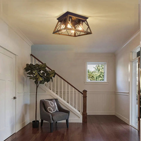 4 Light Industrial Farmhouse Flush Mount Ceiling Light Fixture With Wood Frame And Square Cage in a hallway setting