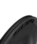 Close-up of Ultra Light Full Carbon Disc Wheel 700C Tubeless Road Wheel for Rim Brakes showcasing carbon fiber texture.
