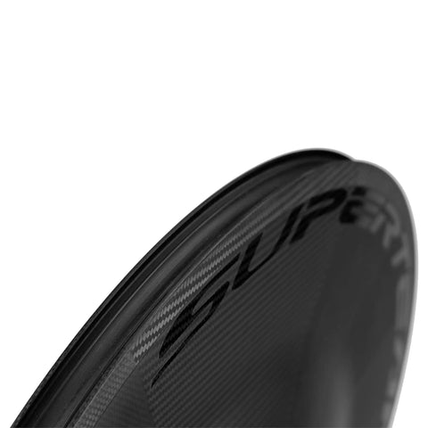 Close-up of Ultra Light Full Carbon Disc Wheel 700C Tubeless Road Wheel for Rim Brakes showcasing carbon fiber texture.