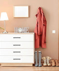 White dresser with 3 Pack Black Cabinet Pulls 3.75 Inch Hole Center Wide Foot Drawer Pulls, next to a jacket and shoes.