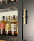 Brushed Brass Cabinet Knobs 4 Pack T Bar Cabinet Pulls Gold Finish 3.9 Inch Length Single Hole Drawer Handles installed on cabinet