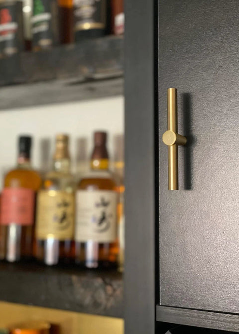 Brushed Brass Cabinet Knobs 4 Pack T Bar Cabinet Pulls Gold Finish 3.9 Inch Length Single Hole Drawer Handles installed on cabinet