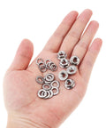 Hand holding nuts and washers from 50 Sets M6 Hex Serrated Flange Nuts Kit With 304 Stainless Steel Lock Nuts And Flat And Lock Washers
