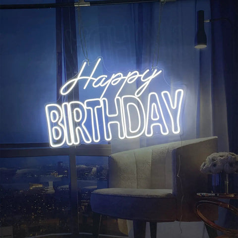 Big Birthday Neon Sign For Wall Decor With Dimmer Switch, 12V Reusable Light Up Birthday Party Decoration, Large White Neon Light Sign For Parties, Windows, Doors hangs in a dimly lit room.