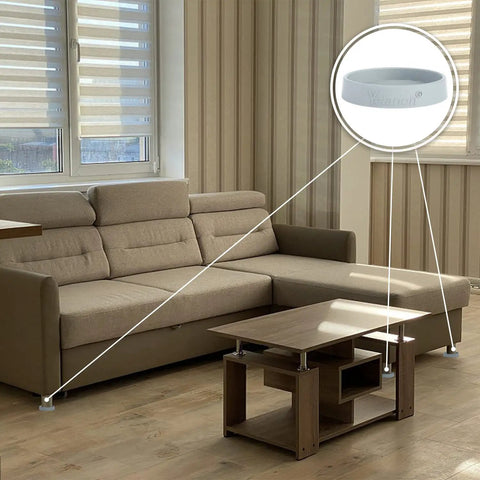 Living room showcasing Eight Pack 3 Inch Round Rubber Furniture Caster Cups Non Slip Pads For Hardwood Floors, Tile, Laminate And Carpet Floors, Anti Slip Floor Protectors For Beds And Couches Gray under couch feet.