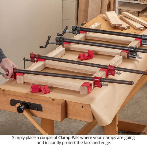 Heavy Duty Woodworking Clamp Pads 12 Pack Shield Boards From Nasty Glue Residue And Dent Marks Universal Fit on clamps in workshop setup.
