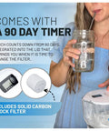 Woman using 10 Cup Water Filter Pitcher With 150 Gallon Filter Life Tritan BPA Free Removes Fluoride And Chlorine Lead And PFAS Forever Chemicals Fridge Ready White And Bamboo