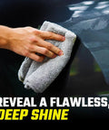 Hand polishing a car surface with microfiber towel, showing the Car Scratch Remover Kit For Scratches And Swirls.