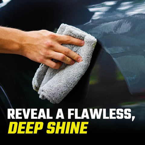 Hand polishing a car surface with microfiber towel, showing the Car Scratch Remover Kit For Scratches And Swirls.