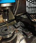 Drill press using a 99 Piece Extra Heavy Duty Drill Bit Set For Steel Wood Metal Copper Aluminum With Rugged Storage Case.