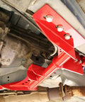 Torque Arm Relocation Kit For 1982 To 1992 Camaro And Firebird TH400 Automatic Transmission Red Short Tail TH400 With 4 Inch Tailshaft For Beefed Up Muscle Car Handling installed undercarriage