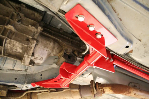 Torque Arm Relocation Kit For 1982 To 1992 Camaro And Firebird TH400 Automatic Transmission Red Short Tail TH400 With 4 Inch Tailshaft For Beefed Up Muscle Car Handling installed undercarriage