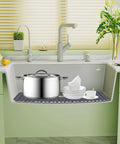 Silicone Sink Protector Mat 26 By 14 Inches For Kitchen Sink Dishes And Glassware Rust Proof Durable No Slip With One Quarter Inch Feet For Noise Reduction Keeps Sink And Tableware Scratch Free in sink with dishes and pot