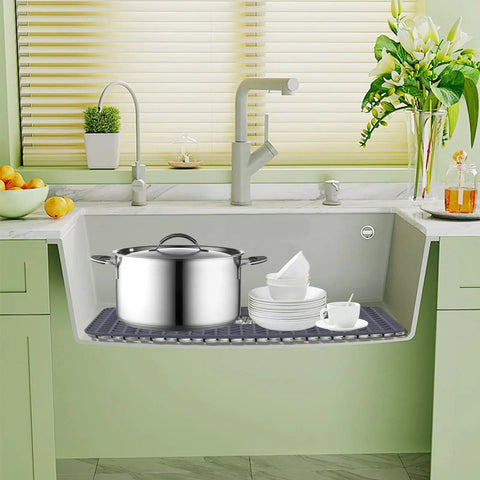 Silicone Sink Protector Mat 26 By 14 Inches For Kitchen Sink Dishes And Glassware Rust Proof Durable No Slip With One Quarter Inch Feet For Noise Reduction Keeps Sink And Tableware Scratch Free in sink with dishes and pot