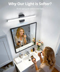 24 Inch Black Vanity Light For Bathroom Mirror LED Wall Bar Fixture illuminating woman applying makeup over mirror