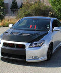 2005 To 2010 Scion tC with LED Halo Projector Headlights Upgrade Kit and black housing, parked outdoors