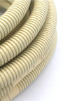 Close-up of flexible mini split drain hose for AC units 5/8 inch ID, 25 ft long, showing ribbed beige texture ideal for HVAC condensate management.