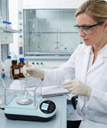 Scientist using Beast Precision Lab Digital Scale 500G X 0.001G With Windshield for laboratory measurements