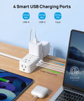 Compact 360 Rotating Flat Plug Power Strip With 5 Foot Cord, Four Widely Spaced Outlets, Heavy Duty Surge Guard, Wall Mountable Slim Body That Crushes Wire Clutter, Perfect For Tight Squeezes And Dorm Digs, Matte White with four USB ports.