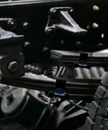 Four Piece Stainless Steel Leaf Spring Clamp Kit For Three Inch Wide Leaf Springs installed on vehicle axle