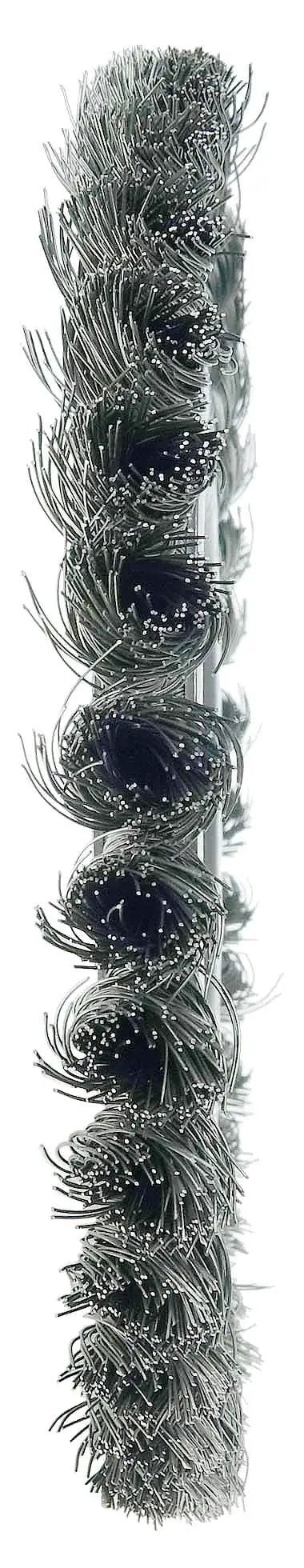 Close-up side view of the Eight Inch Twist Knot Wire Wheel With Steel Fill And Five Eighths Inch Arbor for heavy-duty industrial use.