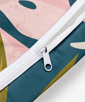 Close-up of zipper on Waterproof Wet Bag For Travel And Beach Days with palm leaf print, ideal for swimsuits, 26x32cm size