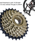 7-Speed Bicycle Freewheel 14-28T Sprocket Set Screw-On Replacement For Mountain And Road Bikes Brass Finish, Stainless Steel Build