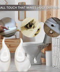 Set Of 2 White Elephant Toilet Bolt Covers Decorative Ceramic Screw Caps on display, highlighting clean toilet decor and maintenance.