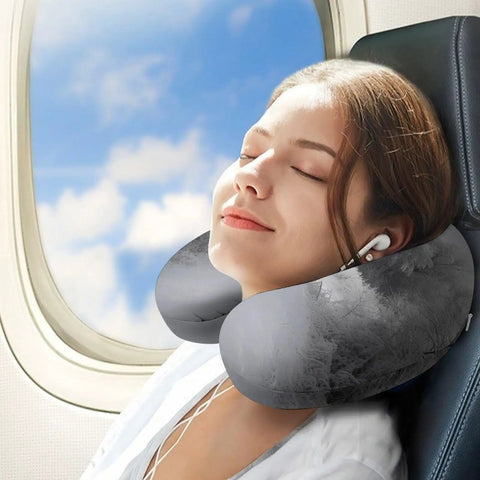Woman using U Shaped Travel Neck Pillow For Airplanes Trains And Cars Comfortable Head And Neck Support Ergonomic Design Reduces Fatigue