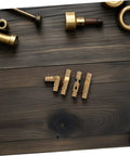 25 Pack Brass Barrel Hinges For Wooden Boxes displayed on a dark wooden surface showing cylindrical design and gold color