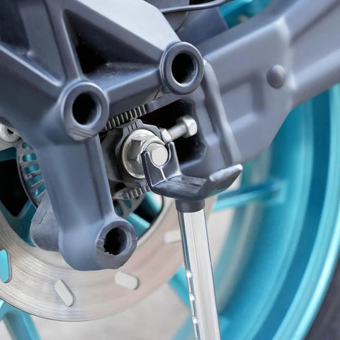 Portable Universal Motorcycle Wheel Lift Stand for Easy Tire and Chain Maintenance and Cleaning installed on rear wheel