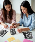 Two women using 40-Piece Magnetic Sheets For Dies Storage With Rubber Magnet Sheets for die cutting and DIY scrapbooking at a table.