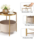 Round End Table With Removable Fabric Storage Basket And Tray Top, Gold Metal Nightstand For Living Room Or Bedroom with items on tray.