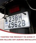 Badass Spike License Plate Screws For Cars, placed on a vehicle registration plate with spiked fasteners securing it.