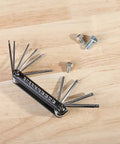Tamper-Proof Folding Star Key Set 10 Pieces T-6 To T-30 with bolts on wooden table