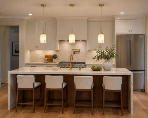 Karjearl Alabaster Pendant Lights Kitchen Island, Modern Gold Hanging Light above a white marble kitchen island.