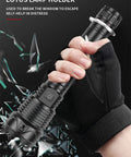 Hand holding Beast Mode 120,000 Lumens USB Rechargeable LED Flashlight with black gloves, showing durable grip and functionality.