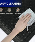 Industrial Grade Anti Fatigue Mat For Standing Comfort All Day 3x5 Ft Thick 15/16 Inch Ergonomic Floor Mat Non Slip Heavy Duty Workshop Pad To Ease Leg And Back Pain being cleaned with cloth showing easy cleaning feature