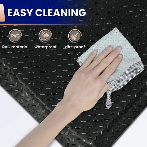 Industrial Grade Anti Fatigue Mat For Standing Comfort All Day 3x5 Ft Thick 15/16 Inch Ergonomic Floor Mat Non Slip Heavy Duty Workshop Pad To Ease Leg And Back Pain being cleaned with cloth showing easy cleaning feature
