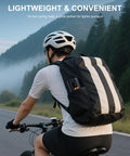 Cyclist with backpack on road, showcasing the 4X Faster Dope Bike Floor Pump With Gauge And Auto Stop 160 PSI Compact Mini Pump.