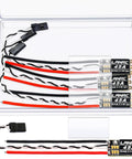 Set Of Four 45A Brushless ESCs For 2S To 6S LiPo With BLHeliS in clear packaging, wires visible, designed for FPV quadcopter fans.